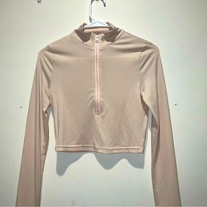 Cropped skintight quarter zip.